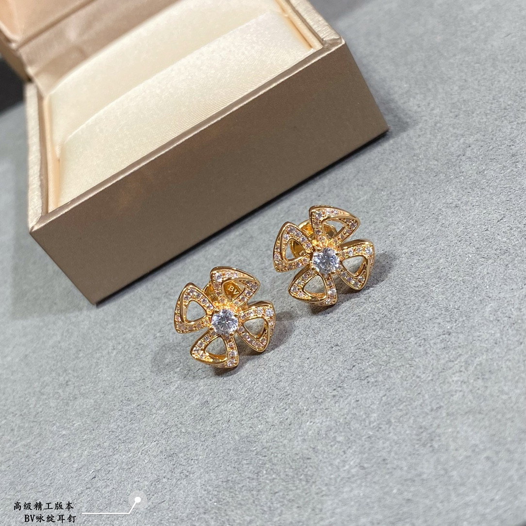 B*l*ai earrings