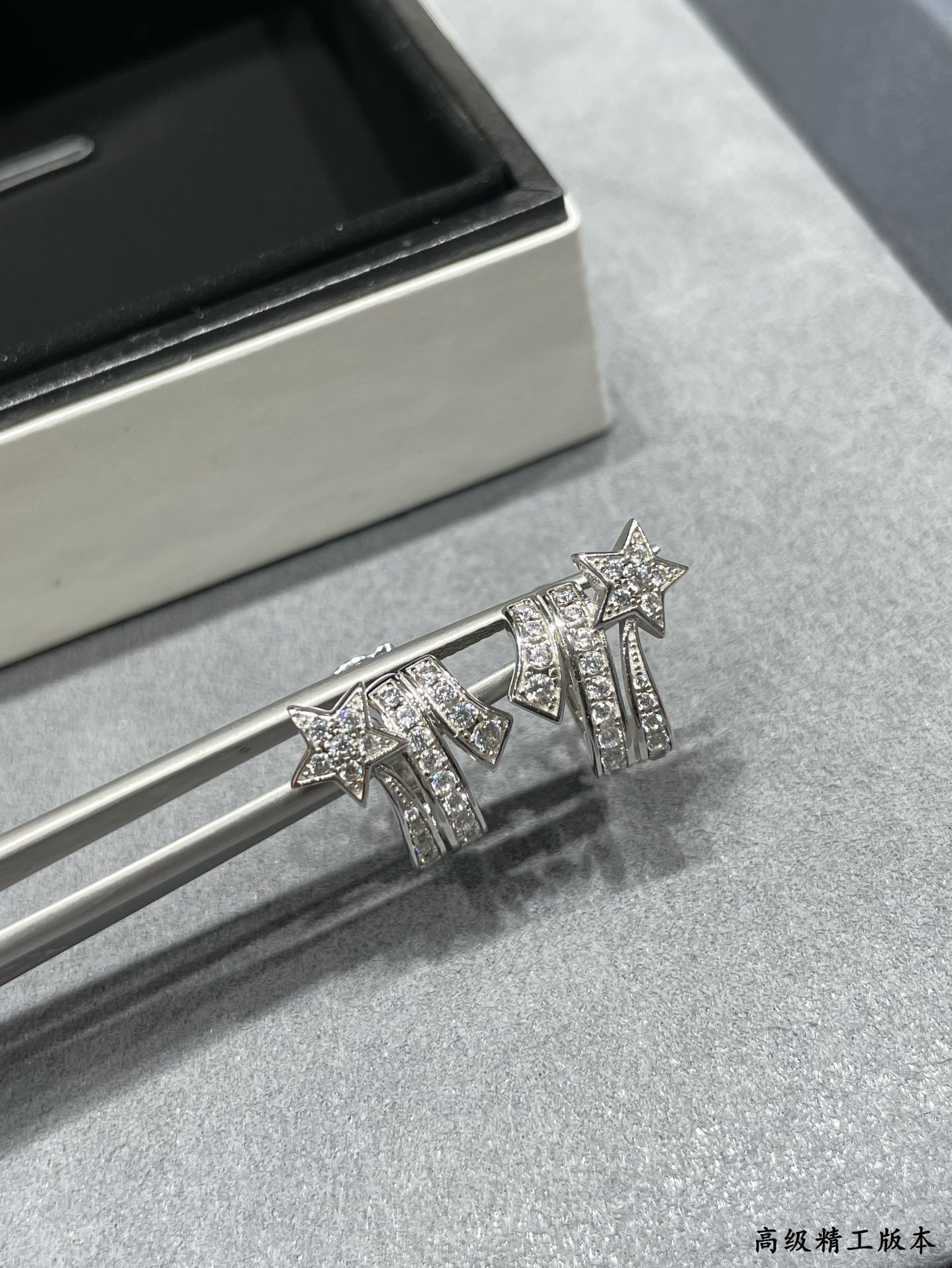 Ch*el comet earrings