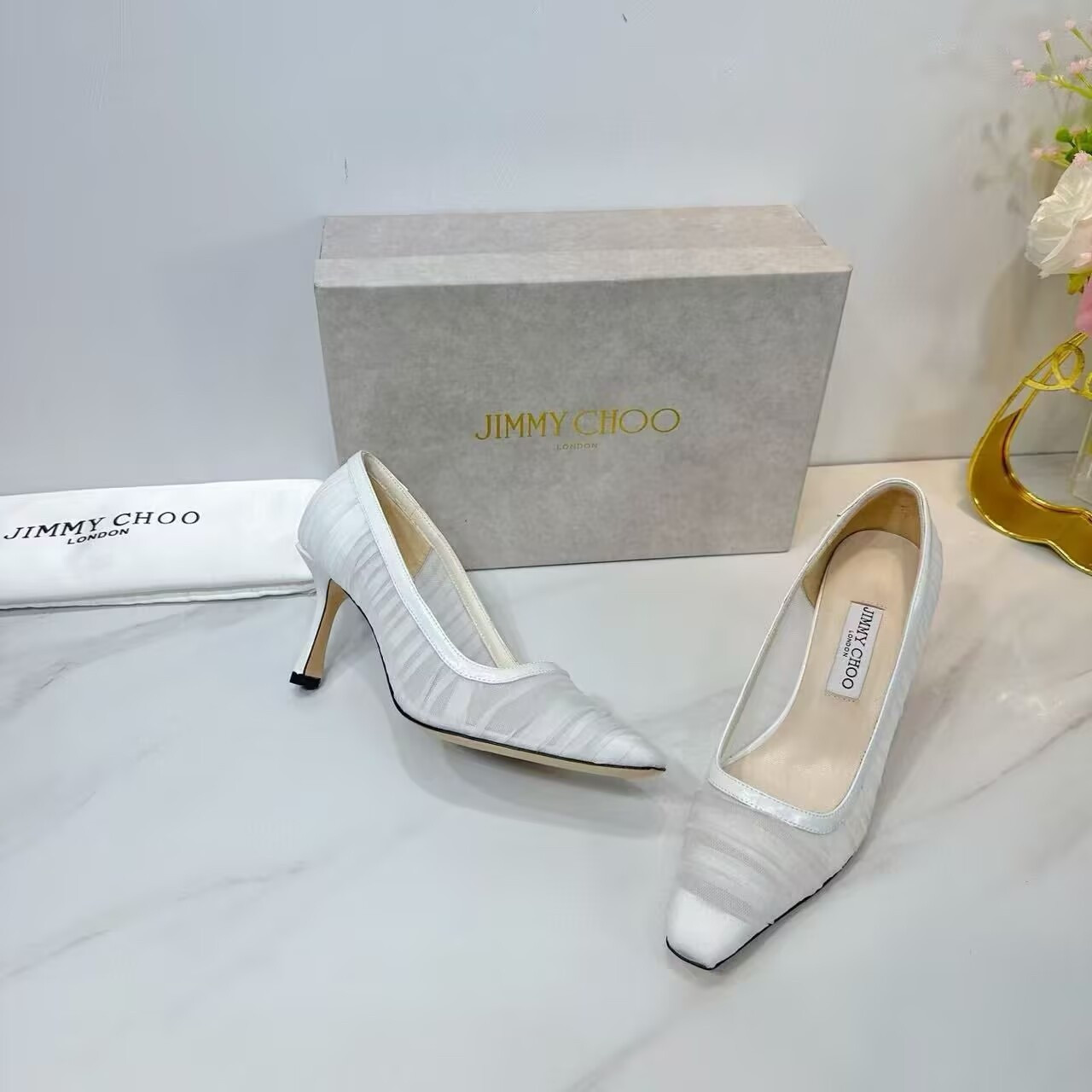 ua Ji*y Ch* ivory tulle and nappa pumps