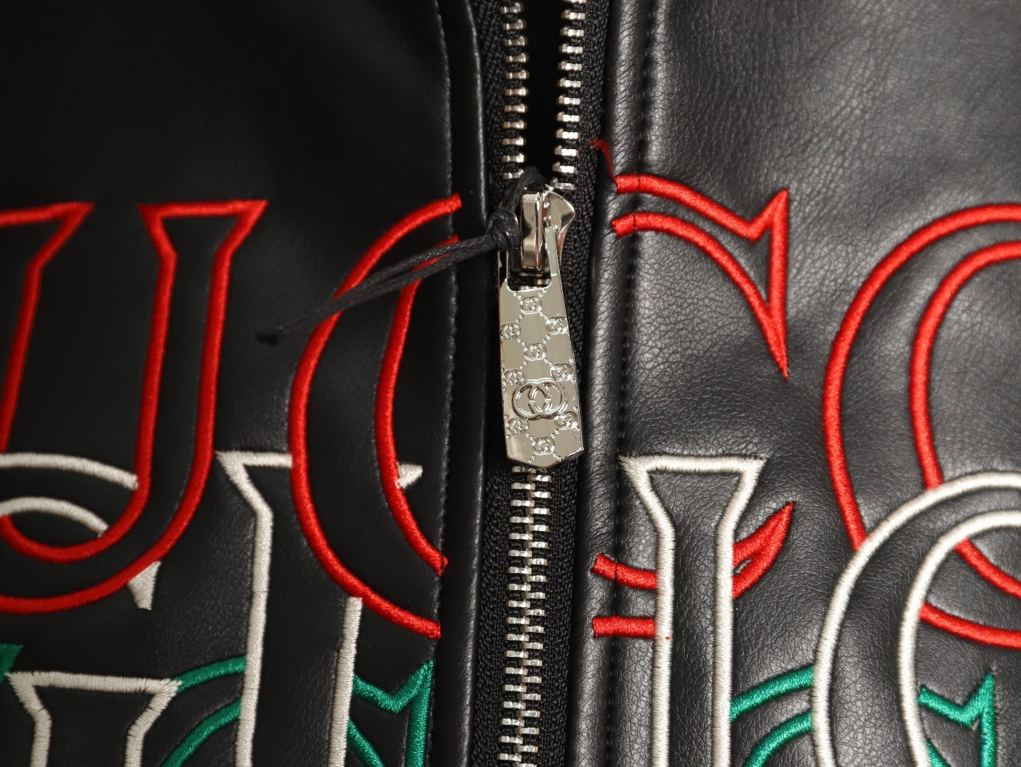 G*u*i leather jacket