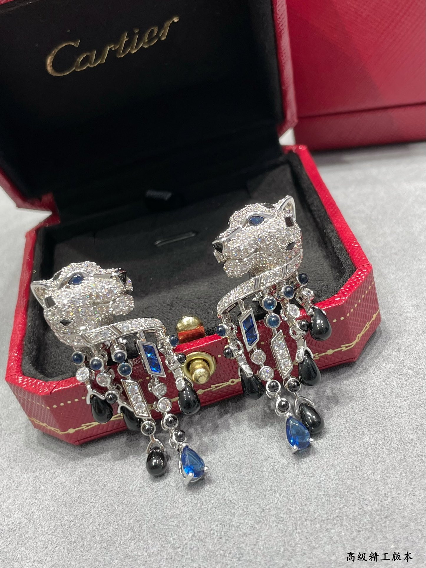 ca*t*er black onyx blue Di*m*nd leopard earrings