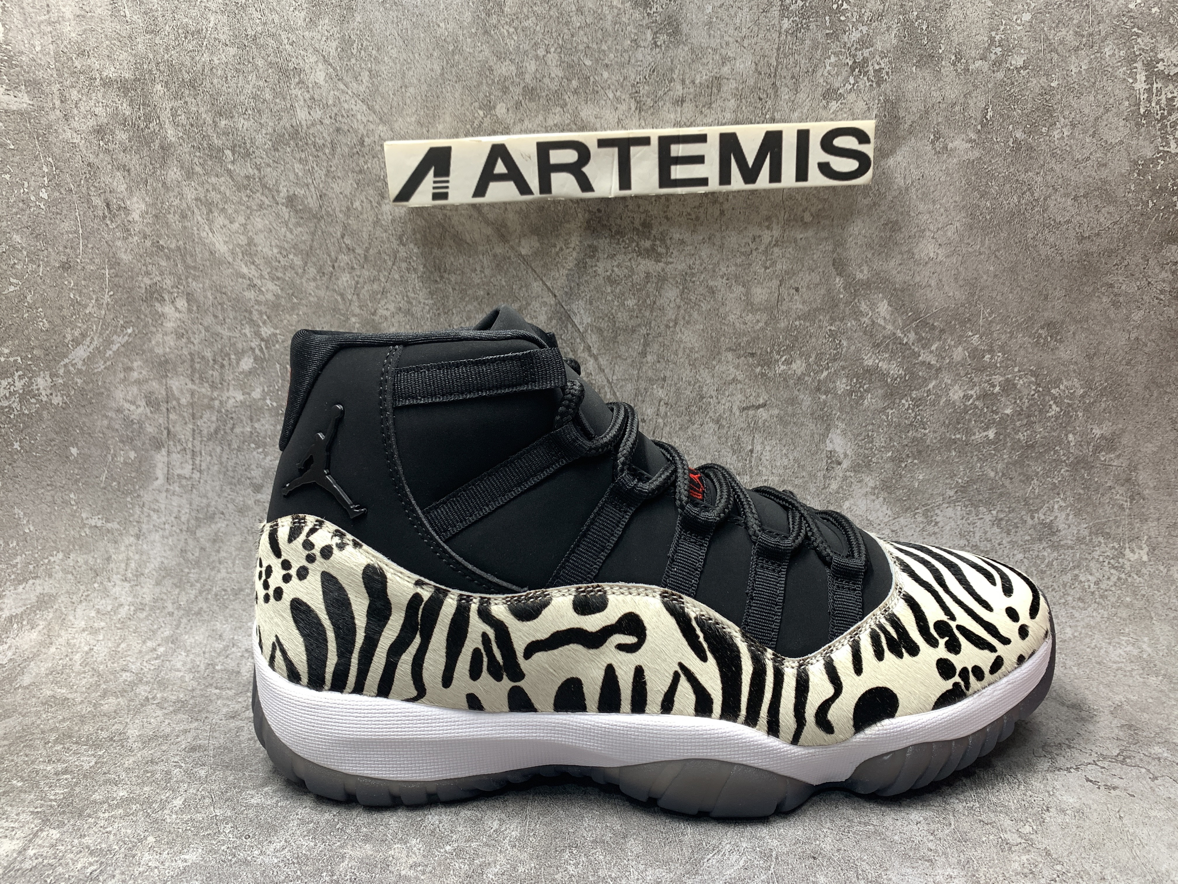 Air Jordan 11 Animal Instinct