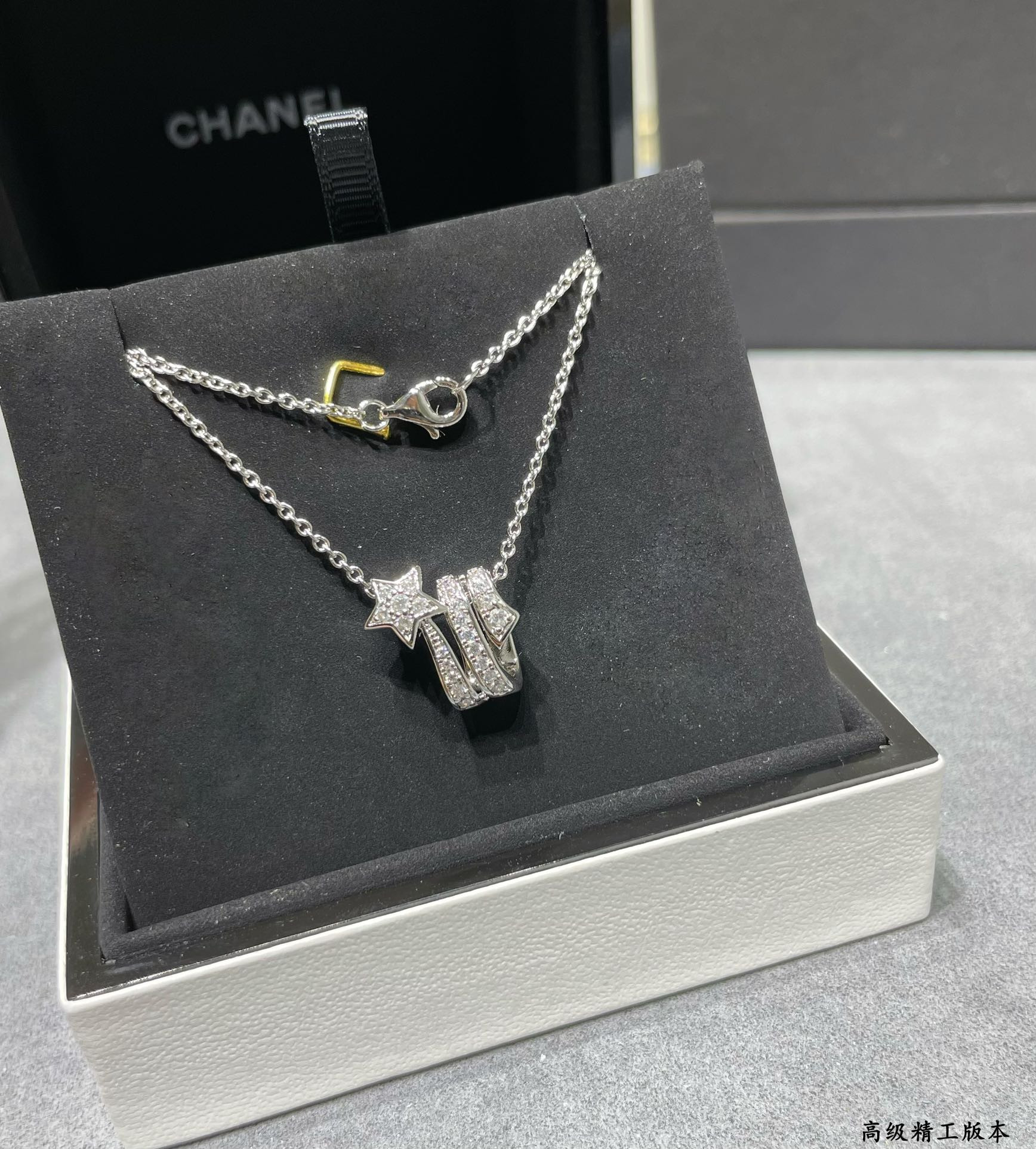Ch*el comet necklace