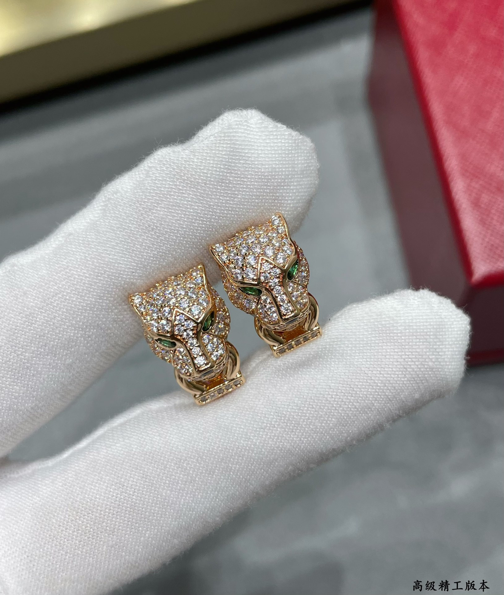 Ca*t*er leopard head earrings