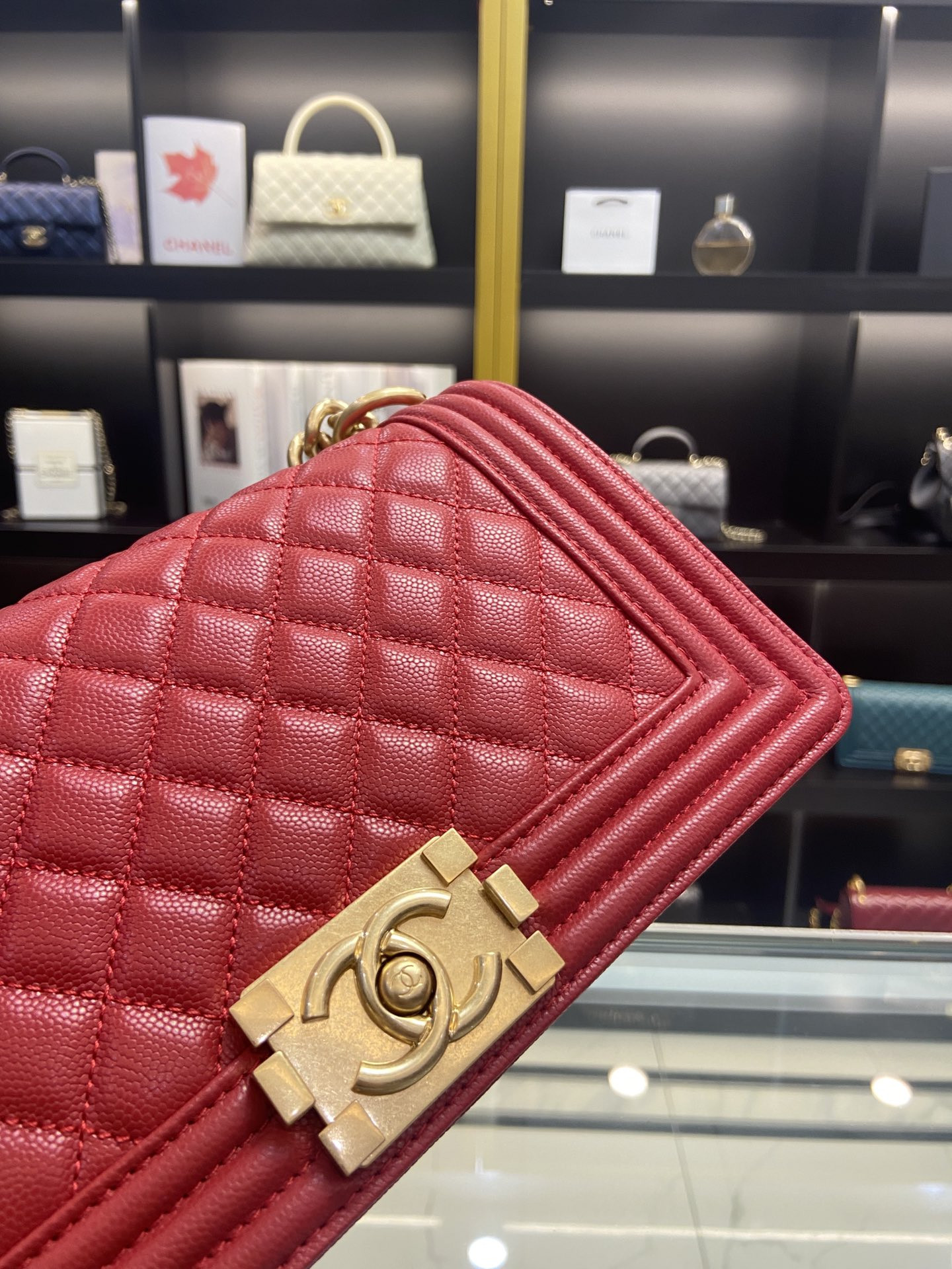 boy Ch*el handbag shiny red grained calfskin & gold-tone metal 5.9 × 9.8 × 3.5 in