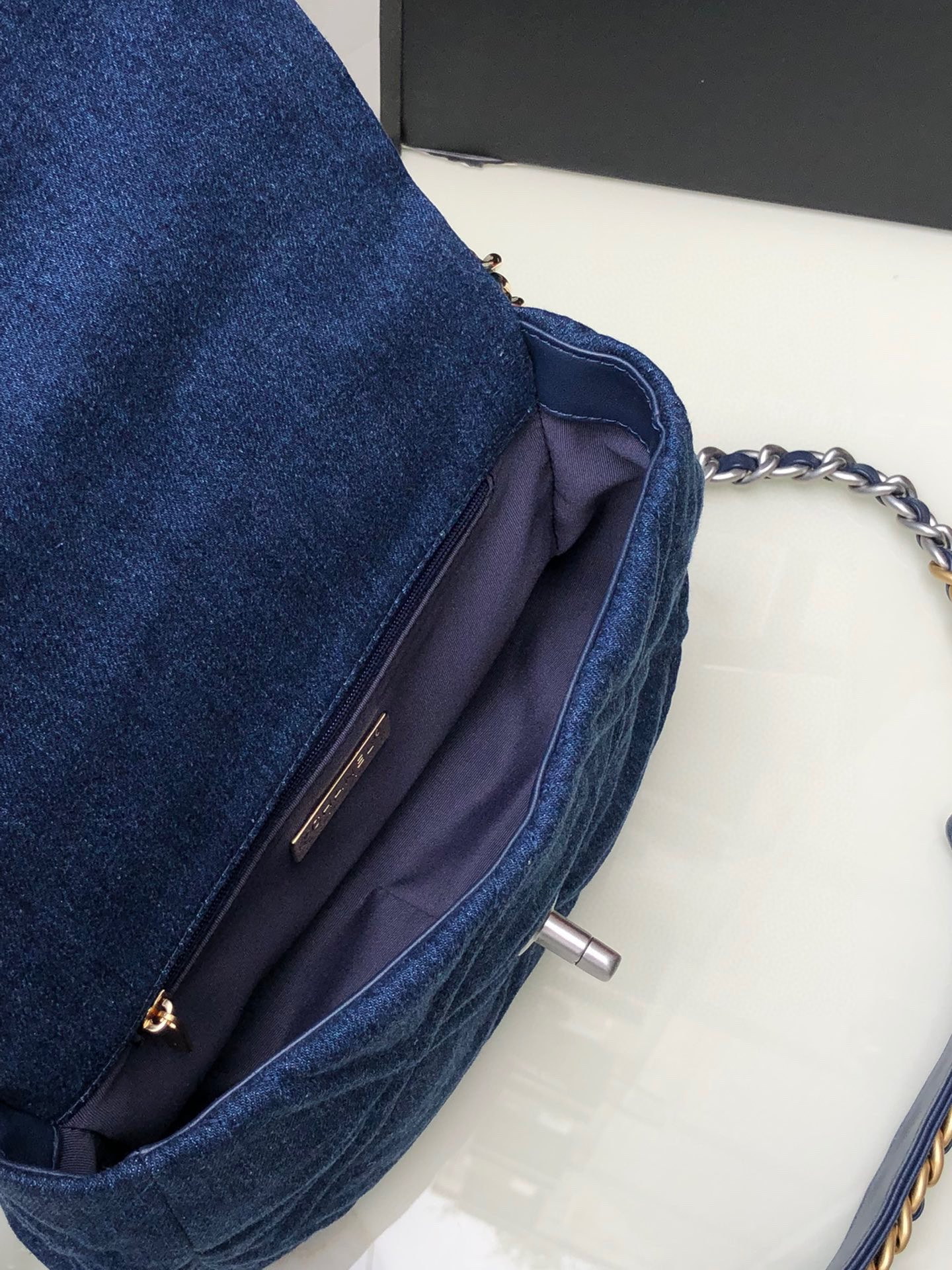 Ch*el 19 handbag, gold-tone, silver-tone & ruthenium-finish metal navy 6.2 × 10.1 × 3.5 in