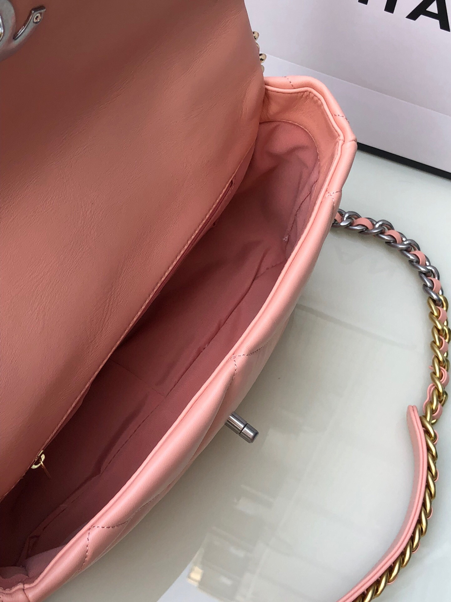 Ch*el 19 large handbag shiny leather, gold-tone, silver-tone & ruthenium-finish metal light pink 7.8 × 11.7 × 3.9 in