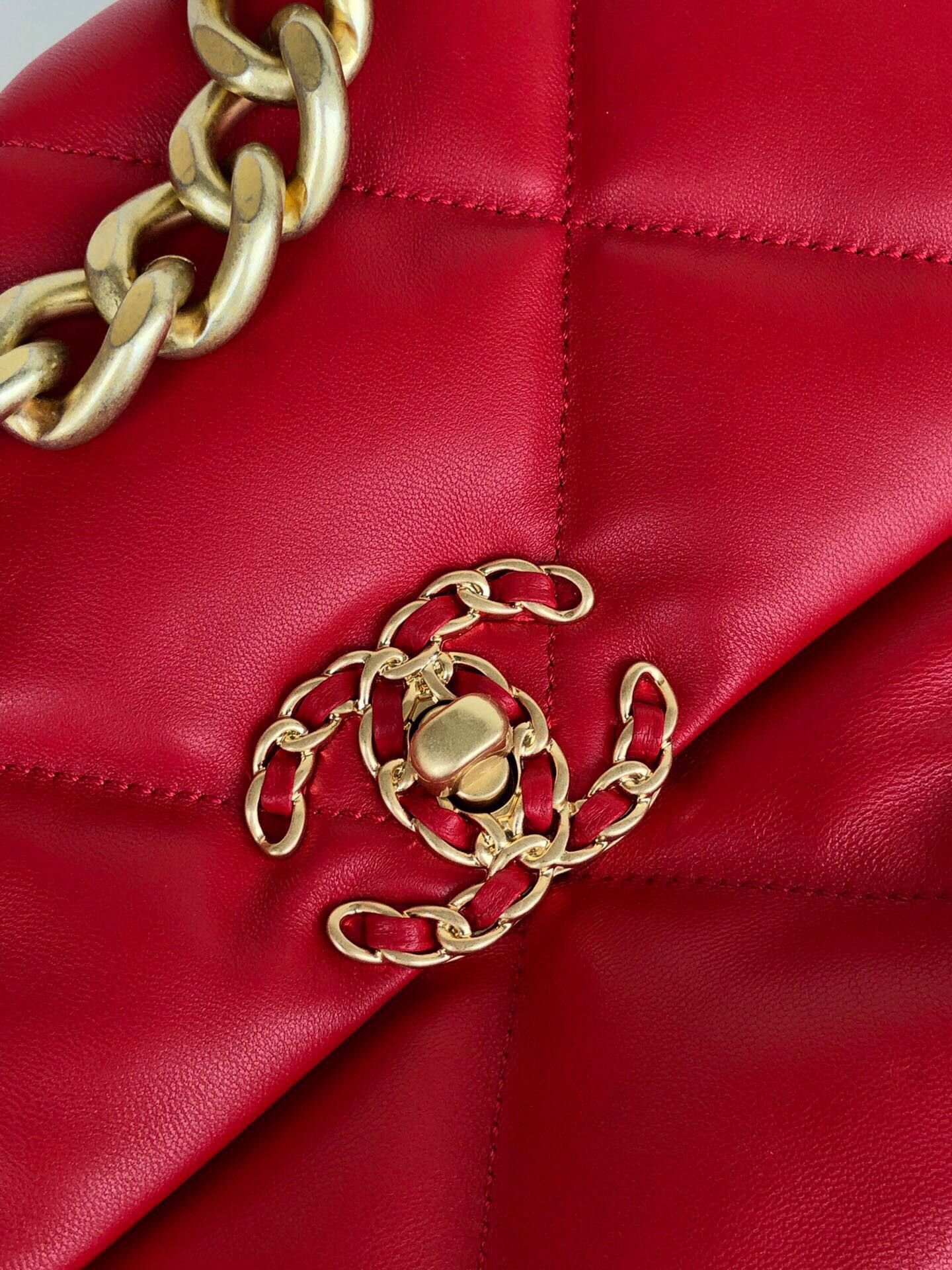 Ch*el 19 large handbag shiny leather, gold-tone, silver-tone & ruthenium-finish metal red 7.8 × 11.7 × 3.9 in