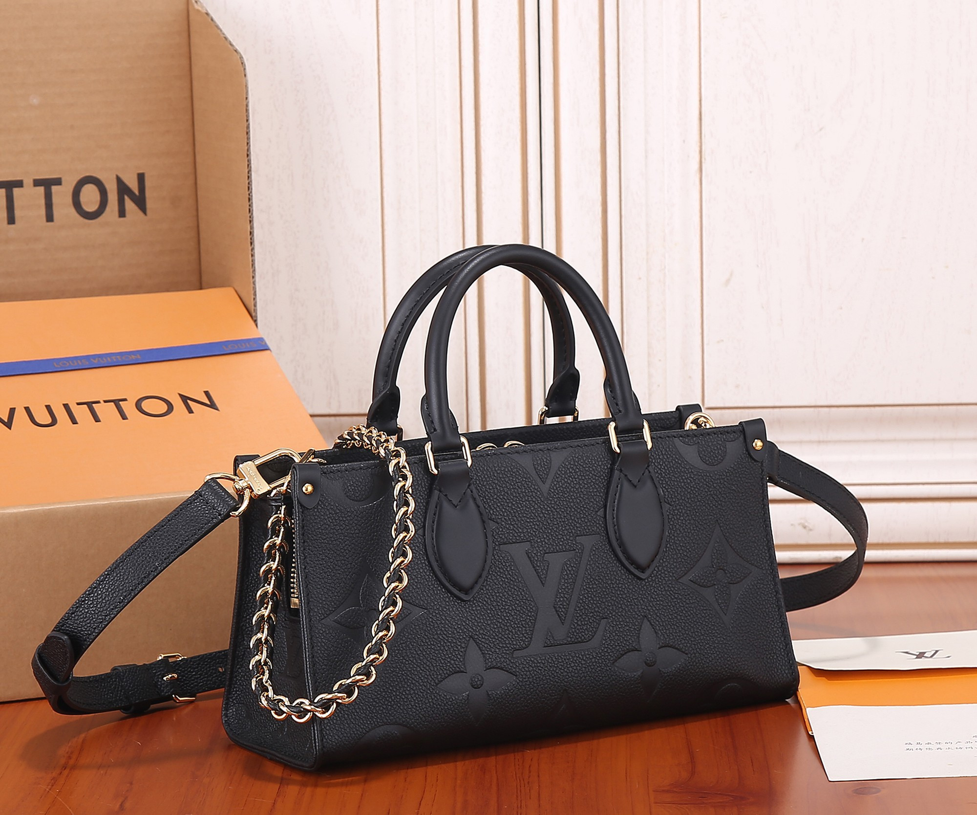 LV OnTheGo East West M23640 9.8 x 5.1 x 3.9 inches