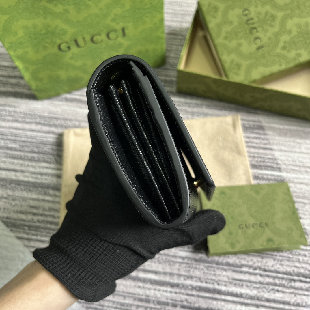 continental wallet with G*u*i script 7.5"w x 4"h x 1.4"d