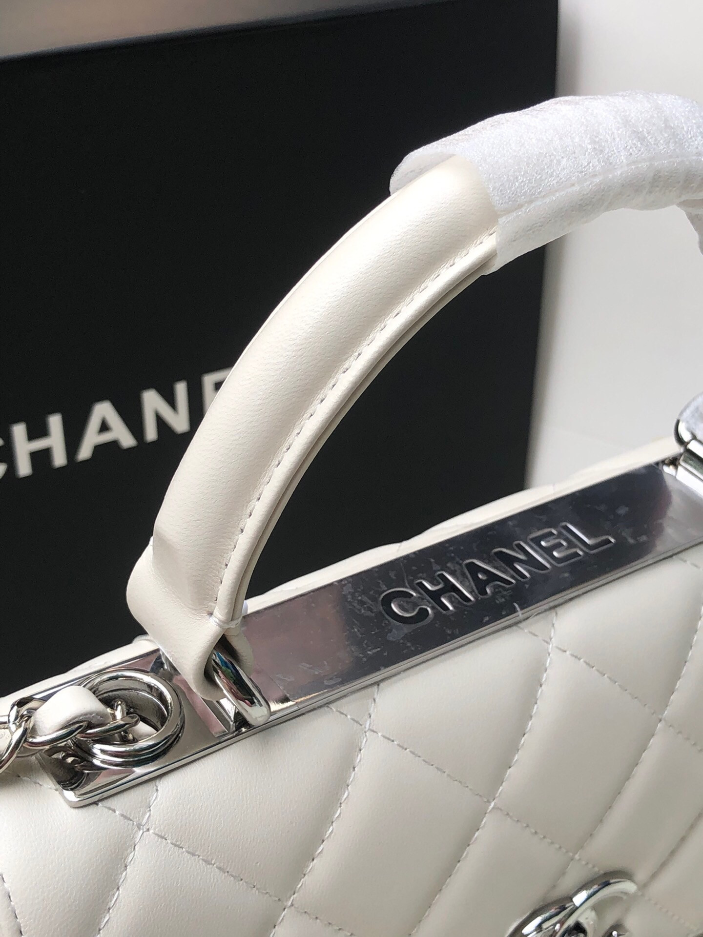 Ch*el flap bag with top handle 6.6 × 9.8 × 4.7 in