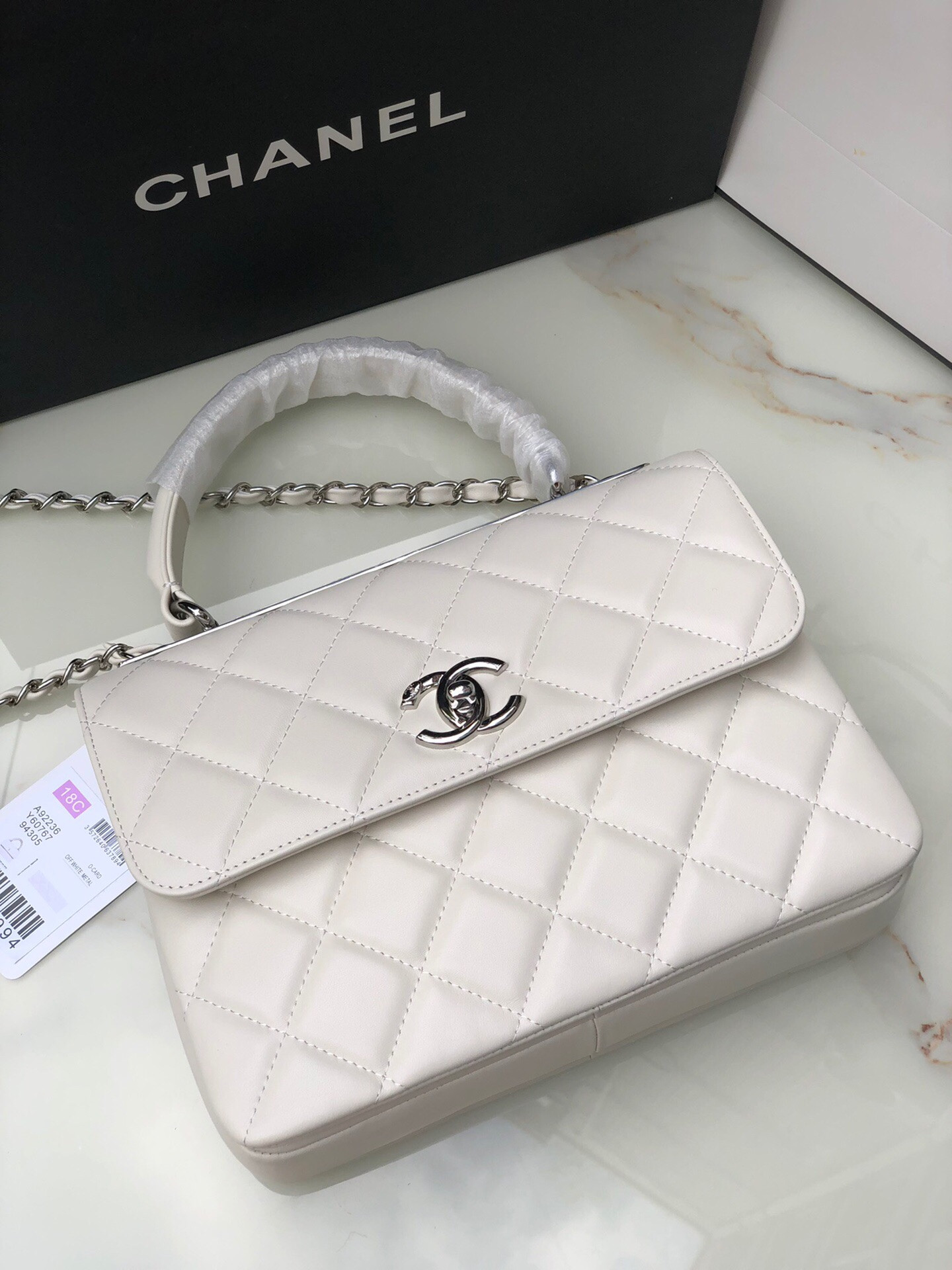 Ch*el flap bag with top handle 6.6 × 9.8 × 4.7 in
