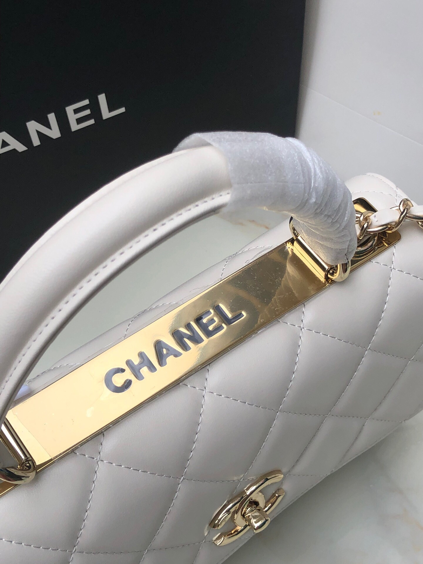 Ch*el flap bag with top handle 6.6 × 9.8 × 4.7 in