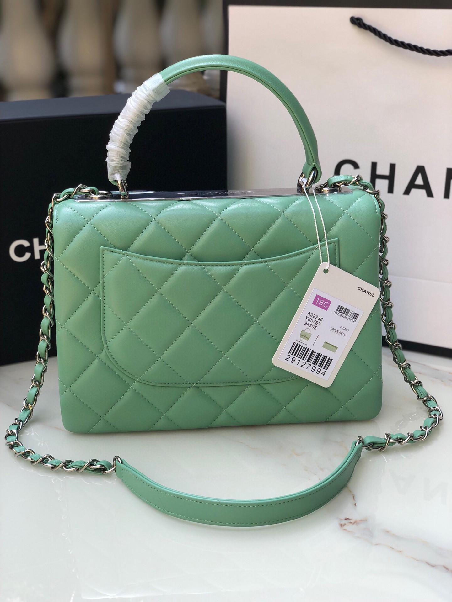 Ch*el flap bag with top handle 6.6 × 9.8 × 4.7 in