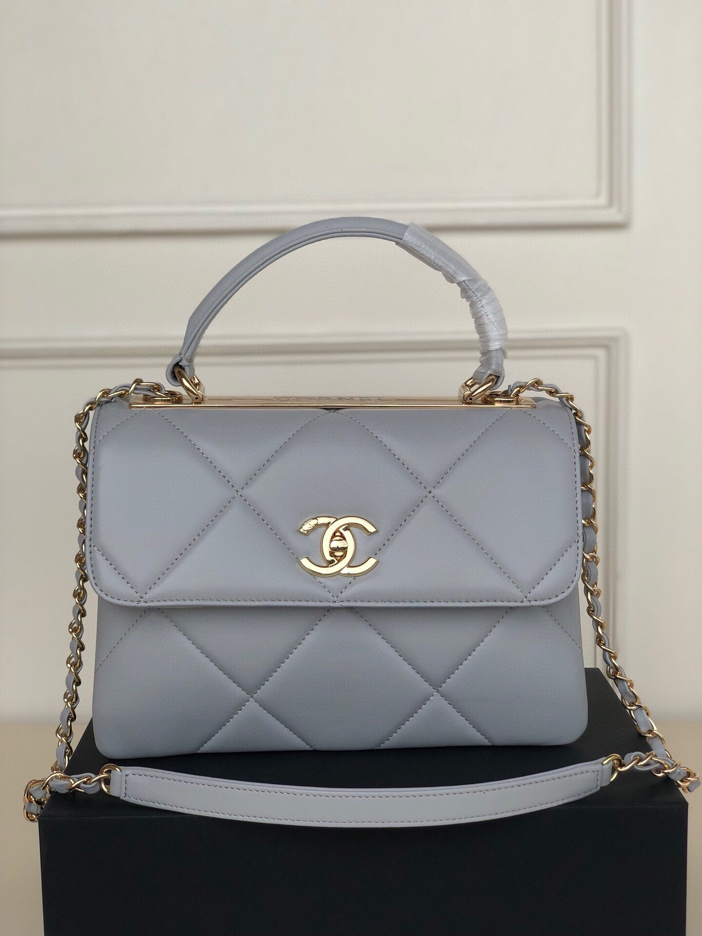 Ch*el flap bag with top handle 6.6 × 9.8 × 4.7 in