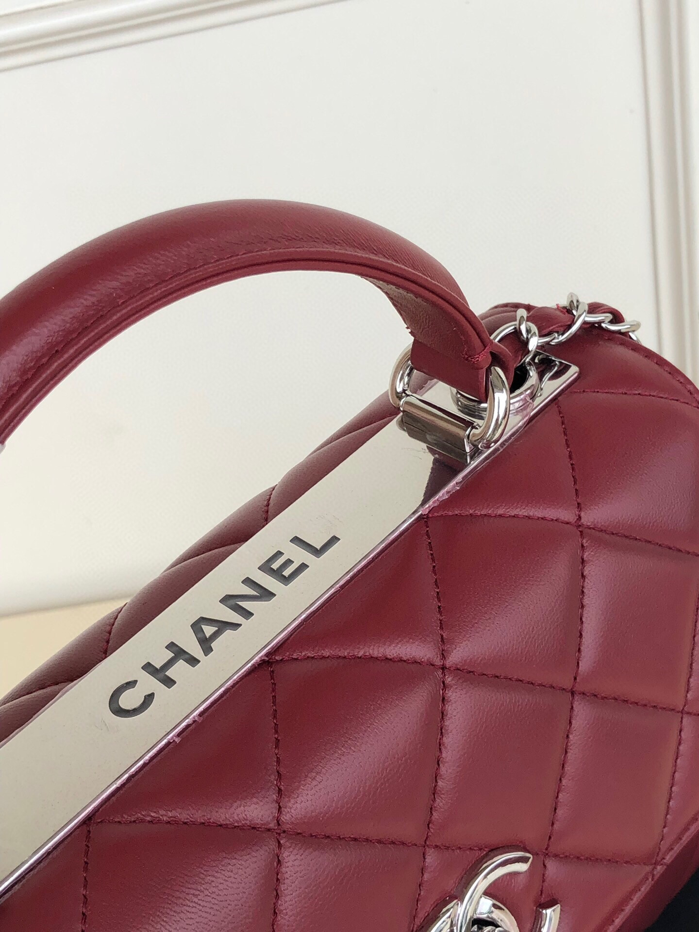 Ch*el flap bag with top handle 6.6 × 9.8 × 4.7 in
