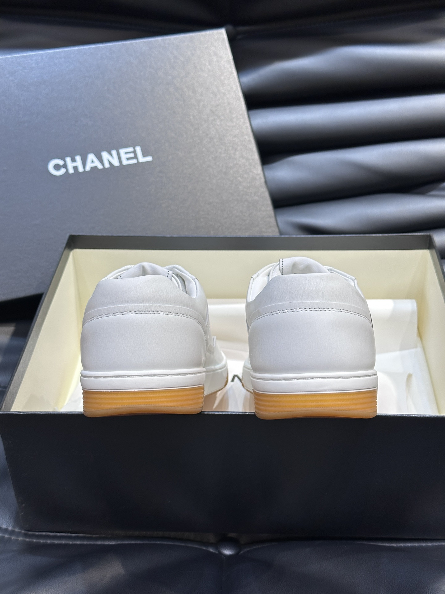 ua Ch*el sneaker calfskin
