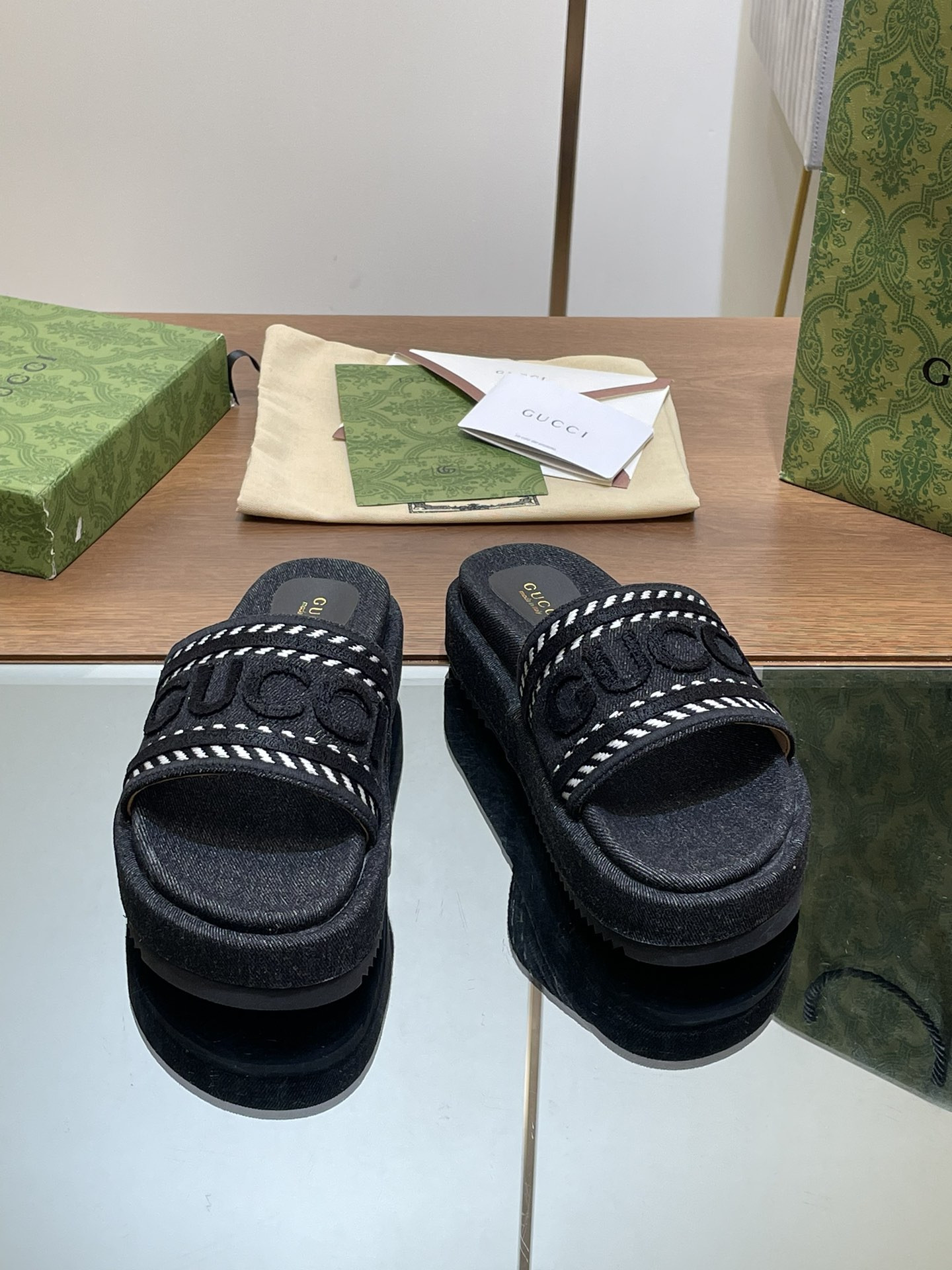 ua G*u*i slide sandal with G*u*i script