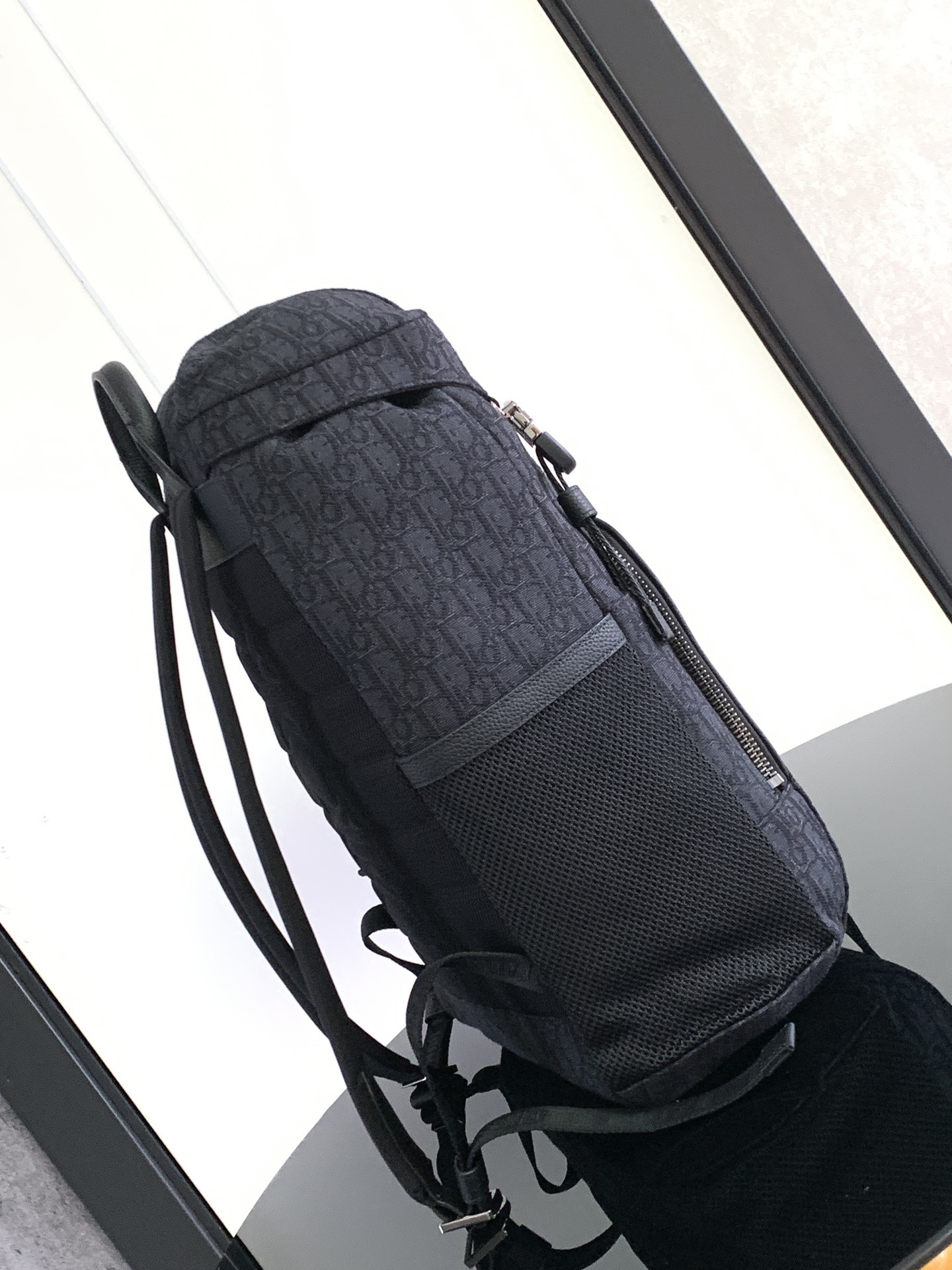 D*or 8 backpack with flap black D*or oblique jacquard 31 x 48 x 16.5 cm