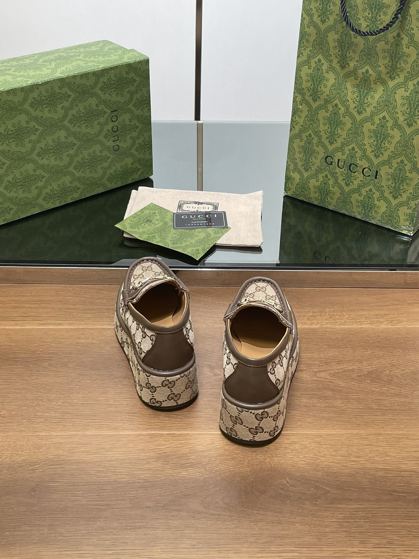 ua G*u*i horsebit wedge loafer