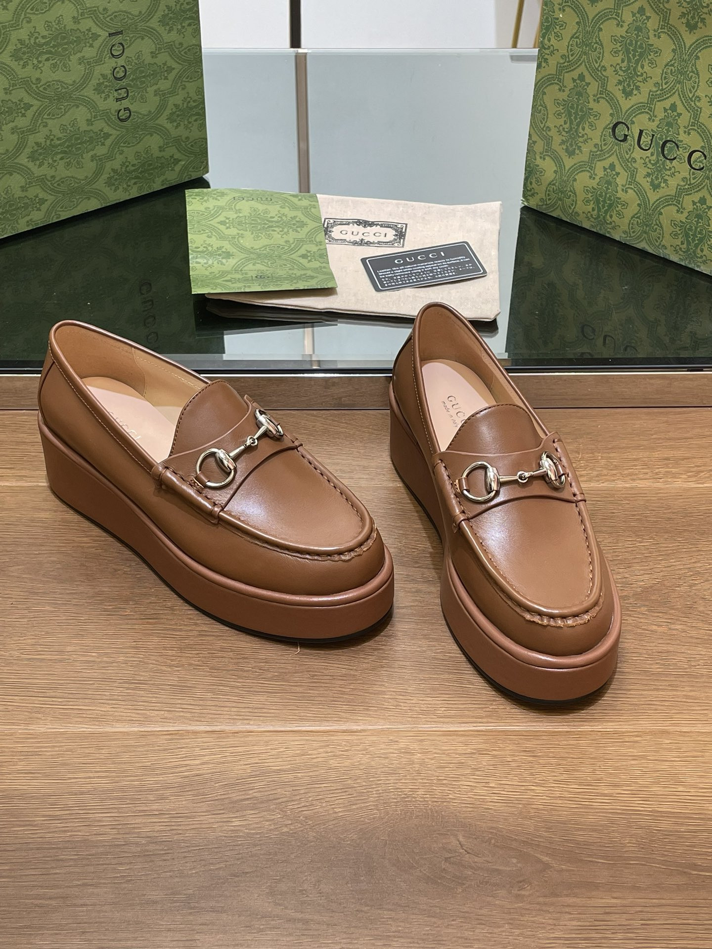 ua G*u*i horsebit wedge loafer