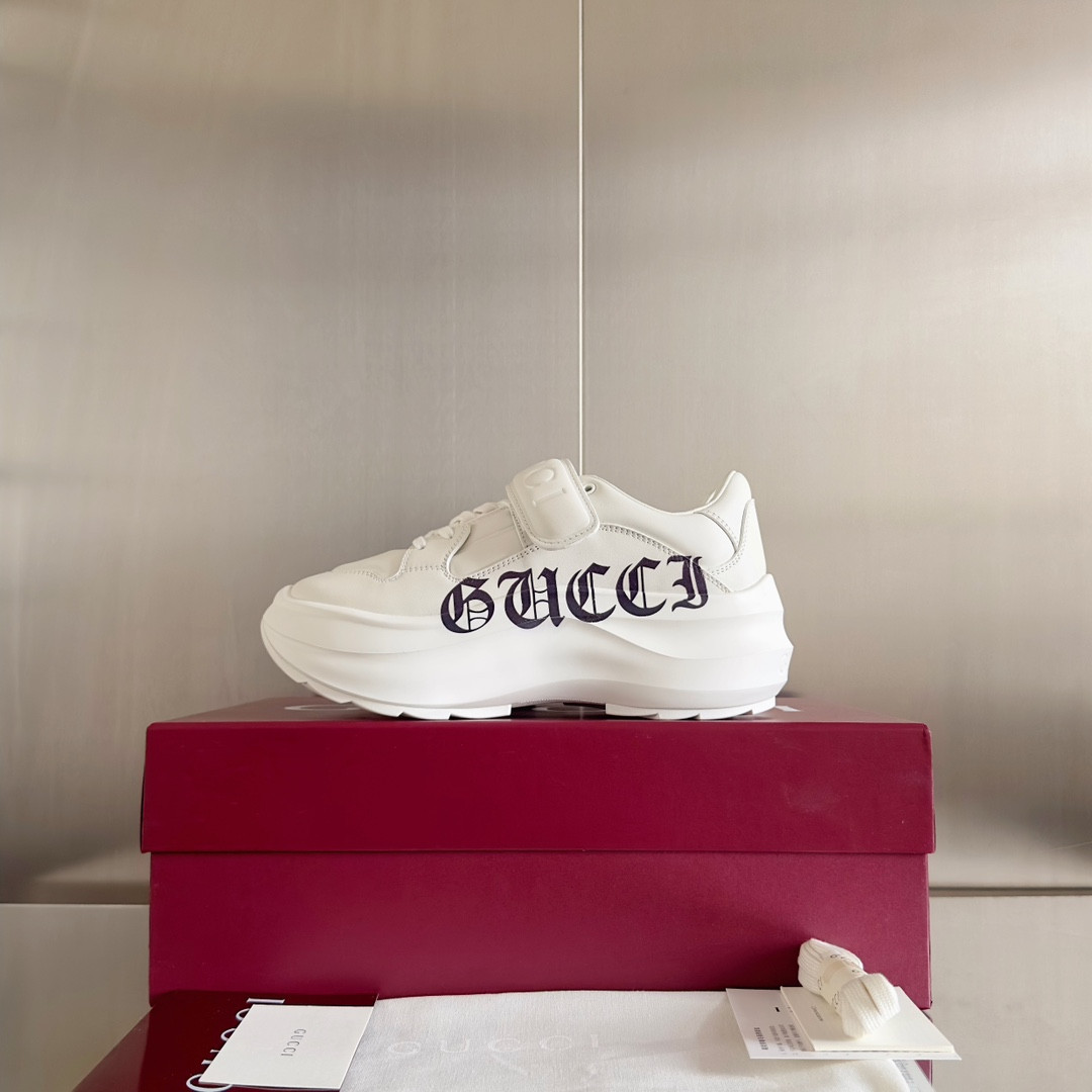 ua G*u*i wave wedge sneaker