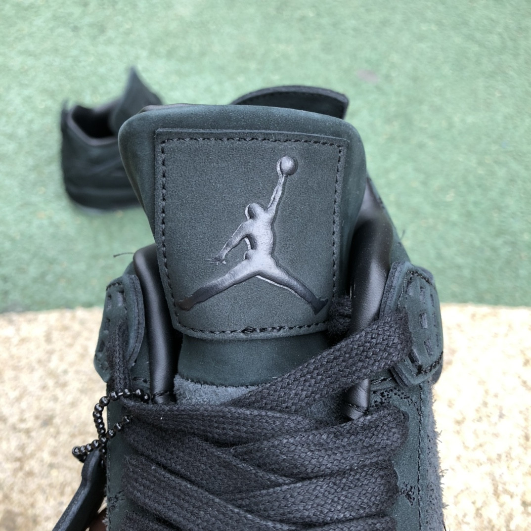 UA Jordan 4 Retro Kaws Black