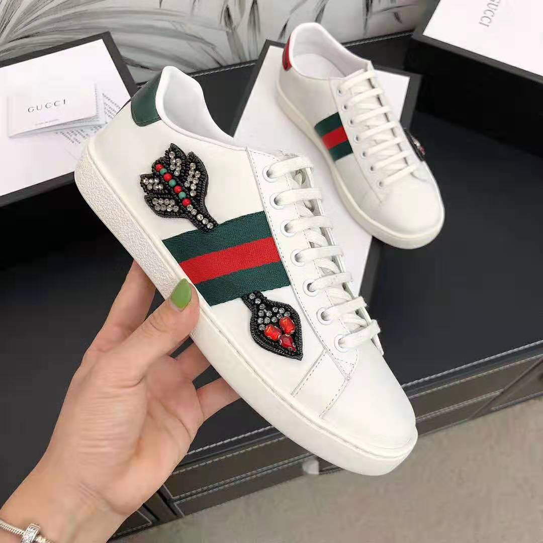 G*u*i unisex ace embroidered sneaker with arrow appliqués-white