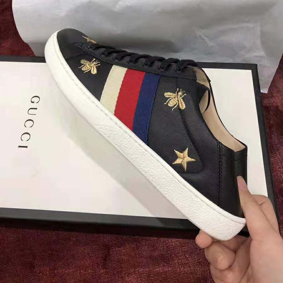 G*u*i men’s ace embroidered sneaker in black leather with bees and stars
