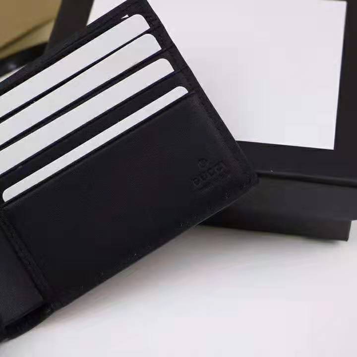 G*u*i gg men G*u*i signature bi-fold wallet in black leather