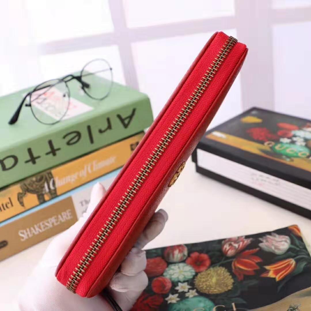G*u*i gg unisex leather zip around wallet in hibiscus red leather