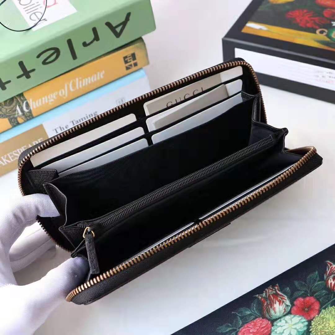 G*u*i gg unisex leather zip around wallet with web in black leather