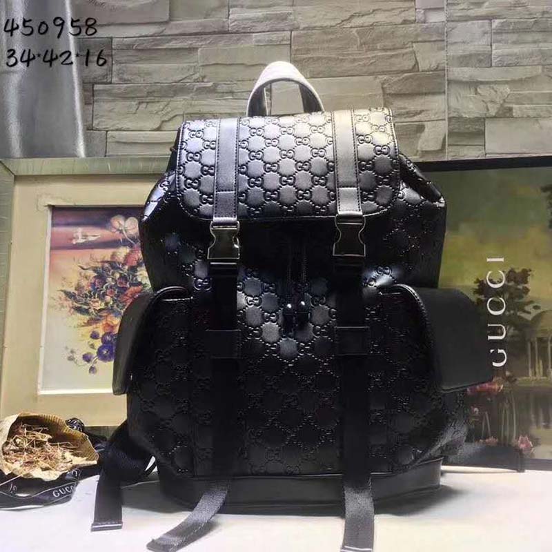 G*u*i gg unisex gg embossed backpack black gg embossed leather