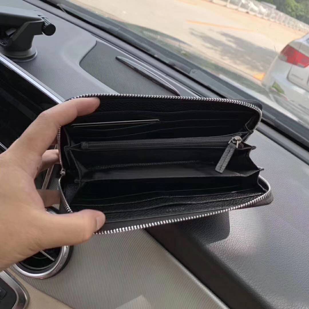 G*u*i gg unisex leather zip around wallet black metal gg