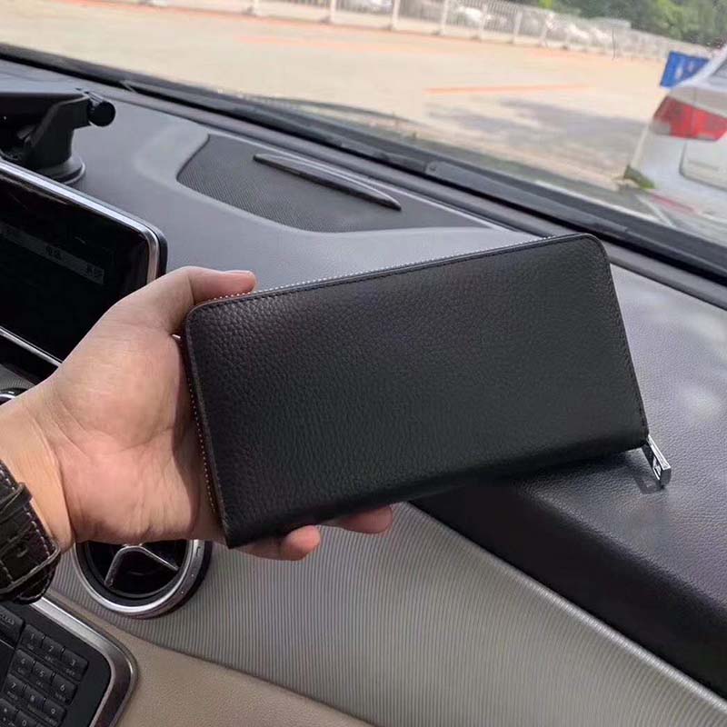 G*u*i gg unisex leather zip around wallet black metal gg