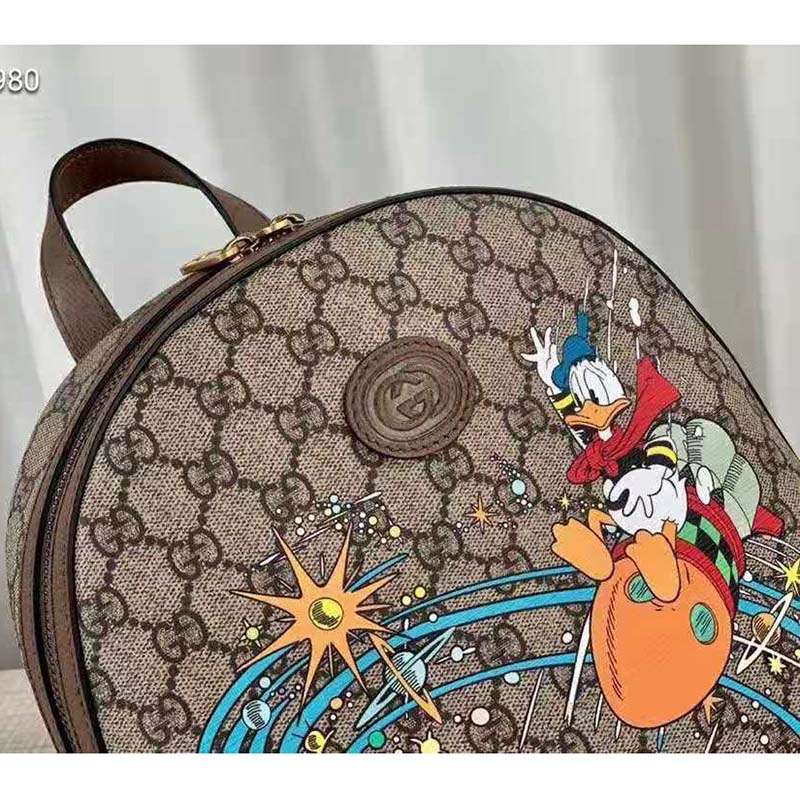 G*u*i unisex disney x G*u*i donald duck small backpack leather interlocking g