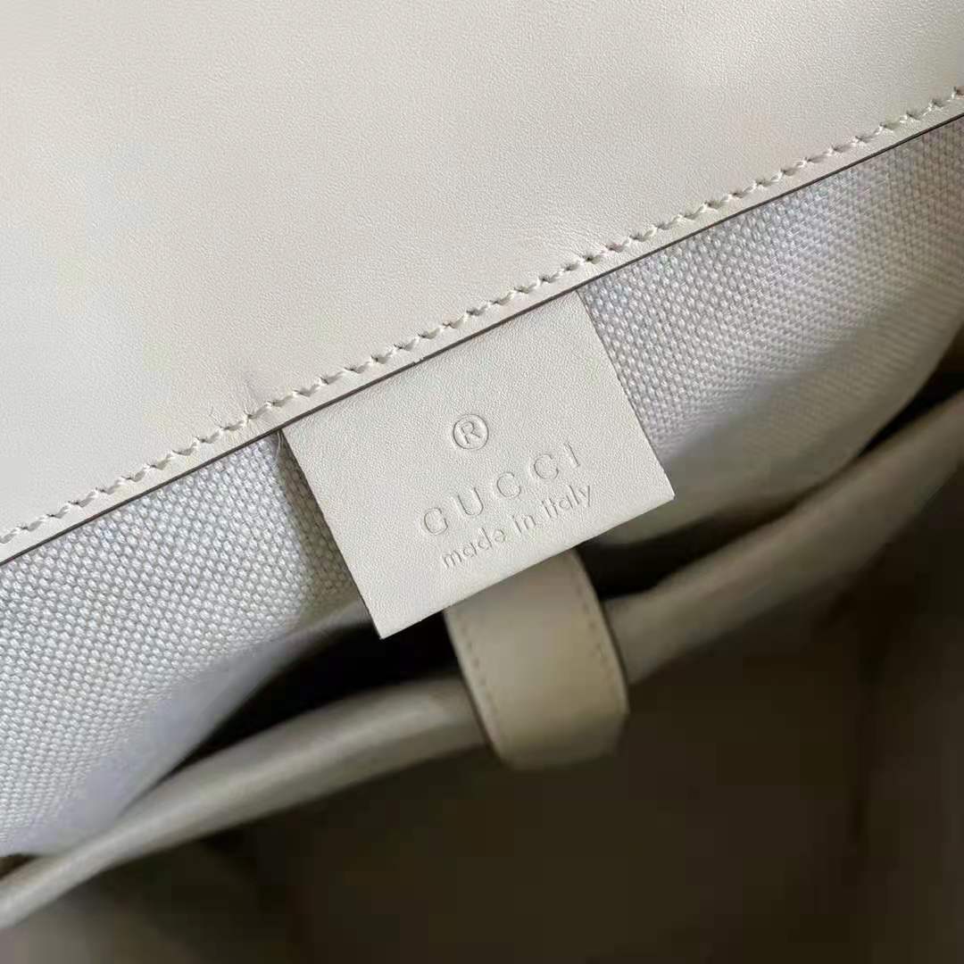 G*u*i gg unisex gg embossed backpack white gg embossed leather