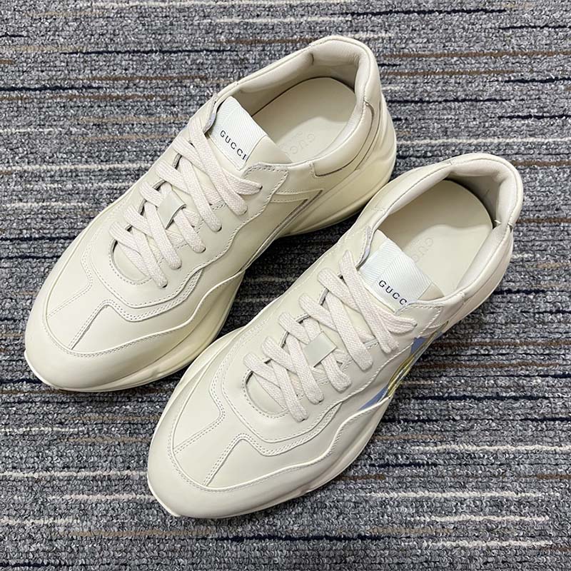 G*u*i unsiex rhyton star print sneaker ivory leather interlocking g rubber sole mid heel