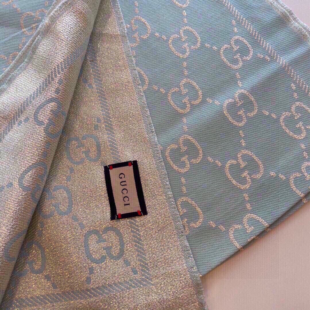 G*u*i unisex gg wool scarf beige mini gg wool turquoise tassel detail