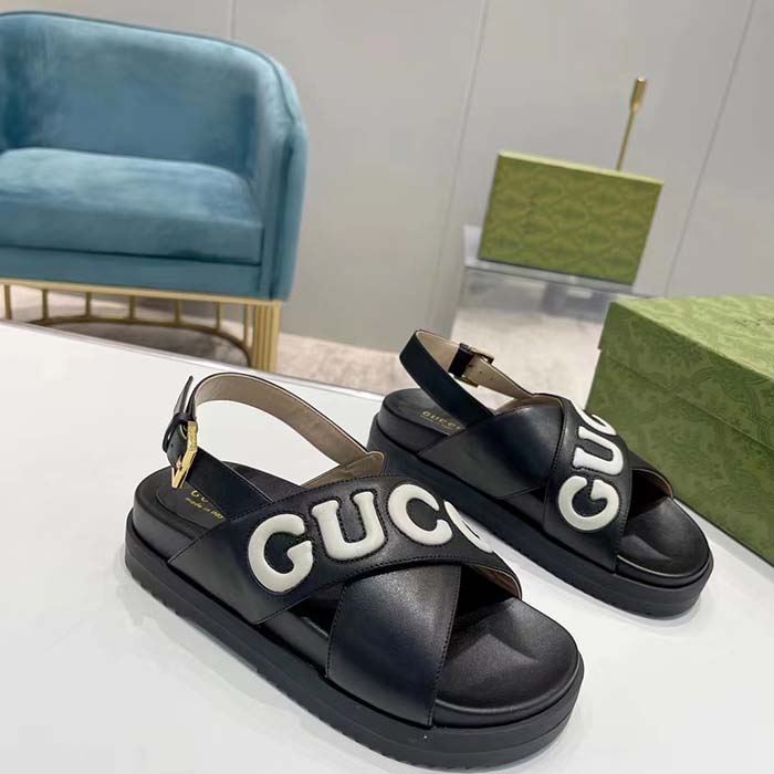G*u*i unisex gg sandal black white leather script rubber buckle flat