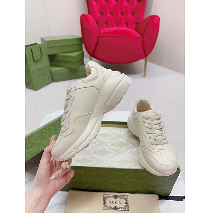 G*u*i unisex interlocking g rhyton sneakers ivory leather navy cut-out rubber sole