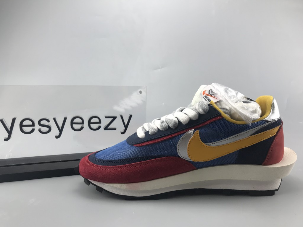 UA NIKE LDWAFFLE/SACAI "VARSITY BLUE"