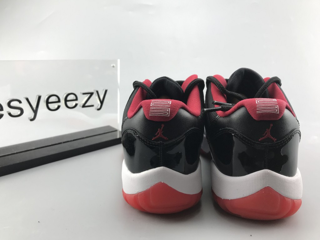 UA AIR JORDAN 11 RETRO LOW BRED