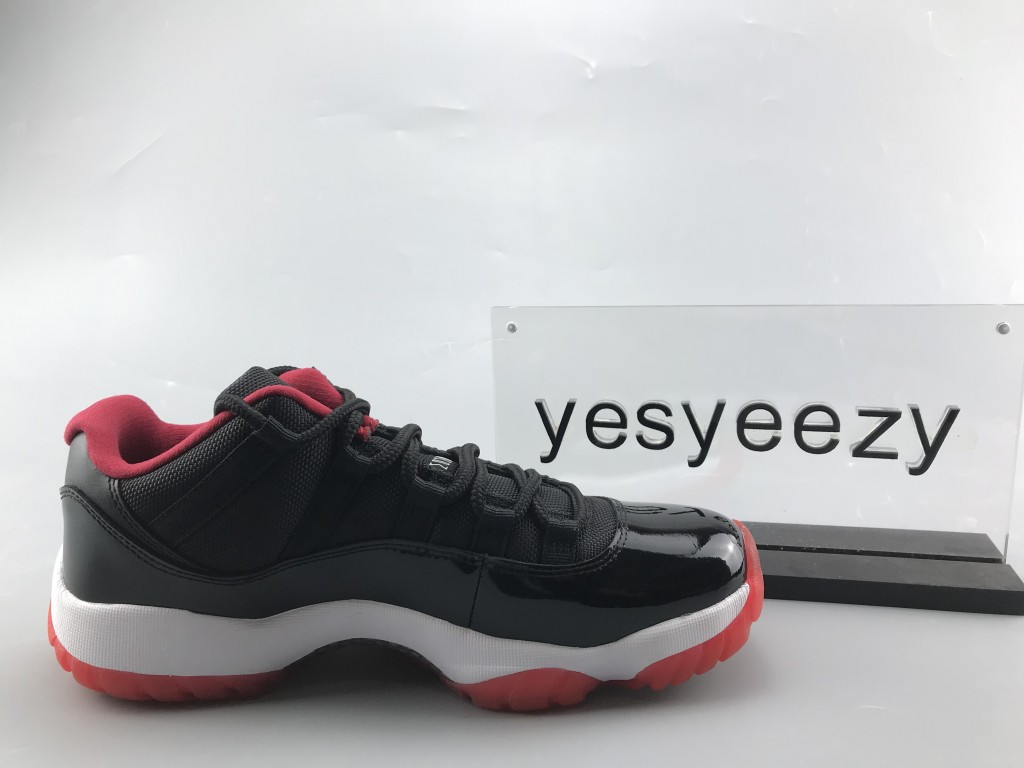 UA AIR JORDAN 11 RETRO LOW BRED