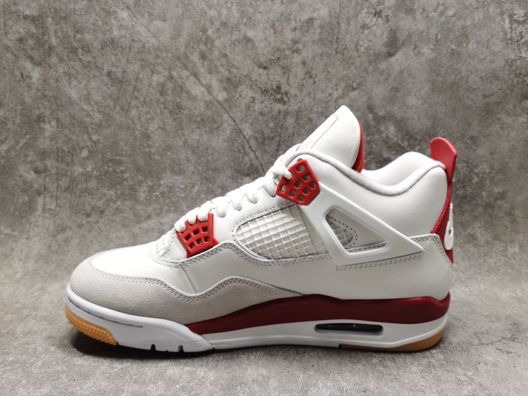 UA Jordan 4 Retro SB