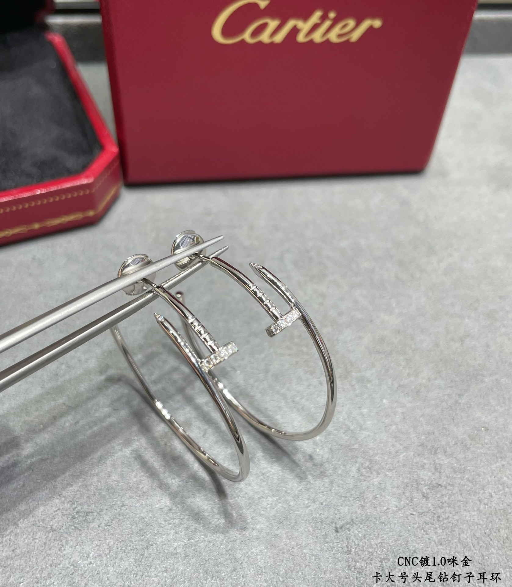 Ca*t1er Large size head and tail D1am0nd nail Earrings