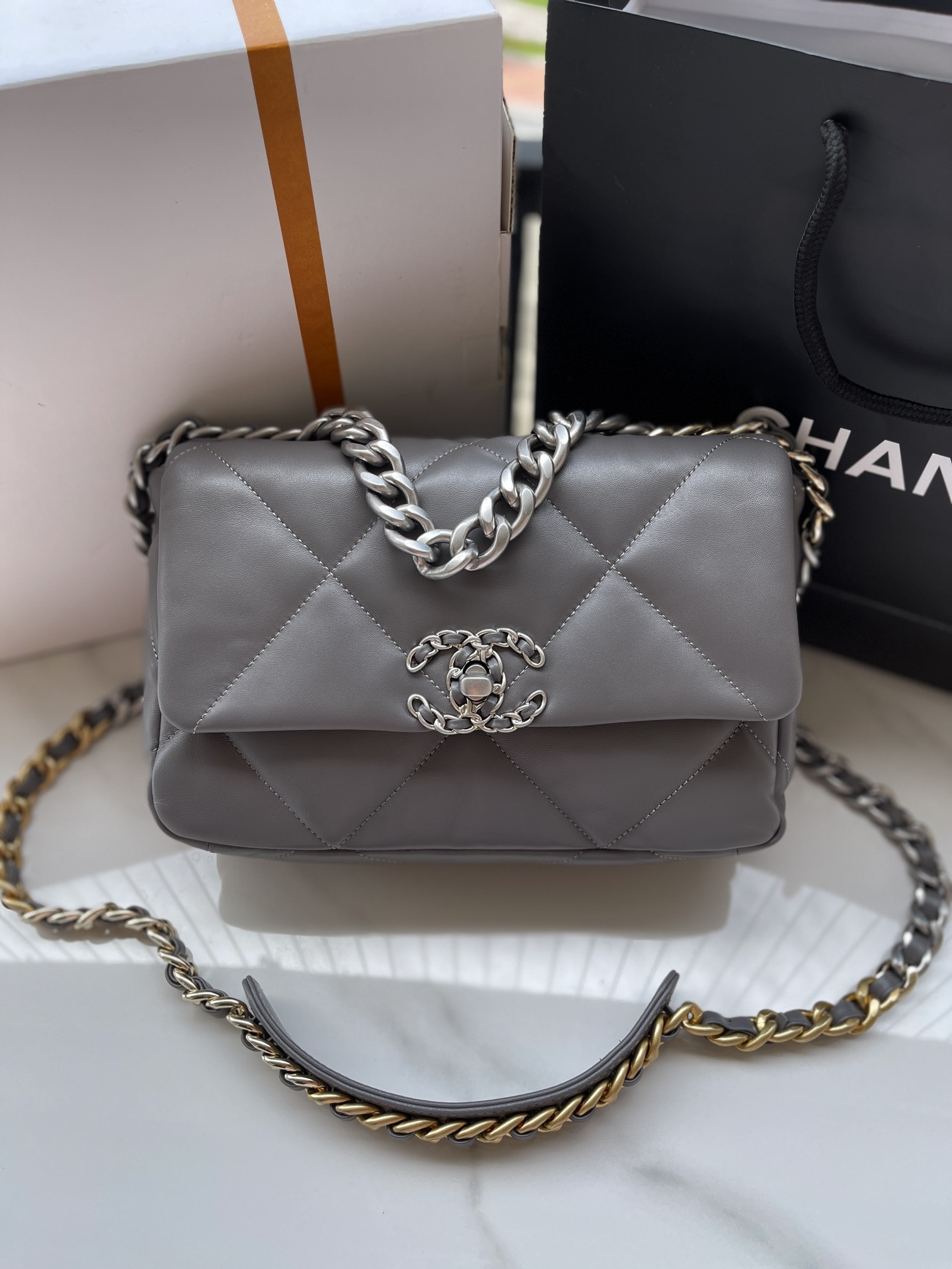 Ch**el 19 HANDBAG Shiny Leather, Gold-Tone, Silver-Tone & Ruthenium-Finish Metal Dark Gray 6.2 × 10.1 × 3.5 in