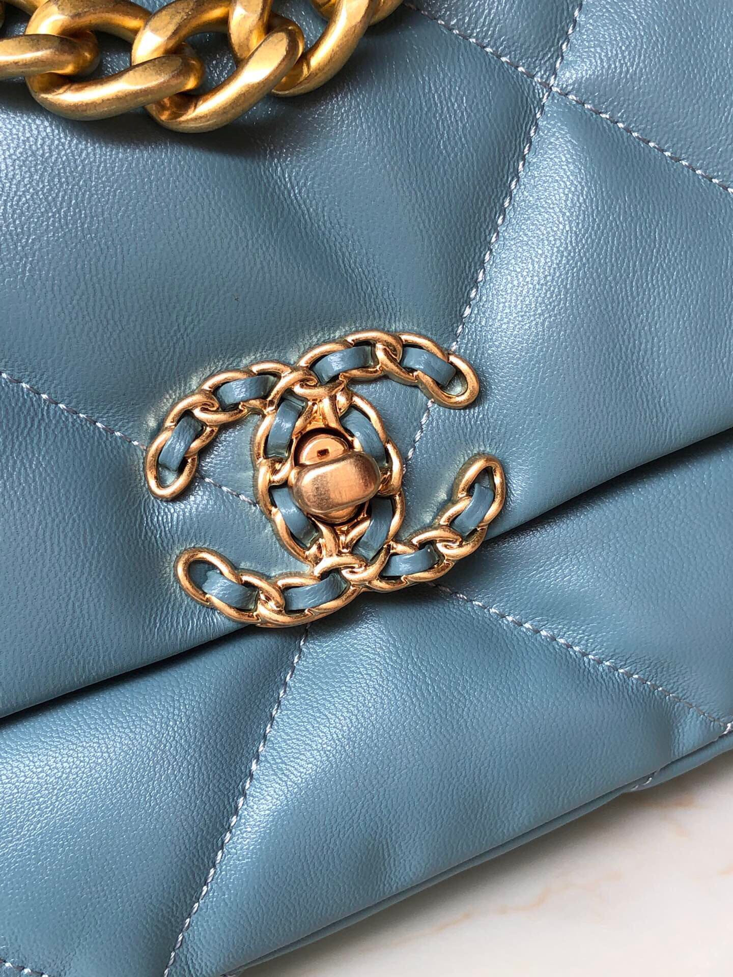 Ch**el 19 HANDBAG Shiny Leather, Gold-Tone, Silver-Tone & Ruthenium-Finish Metal Blue 6.2 × 10.1 × 3.5 in