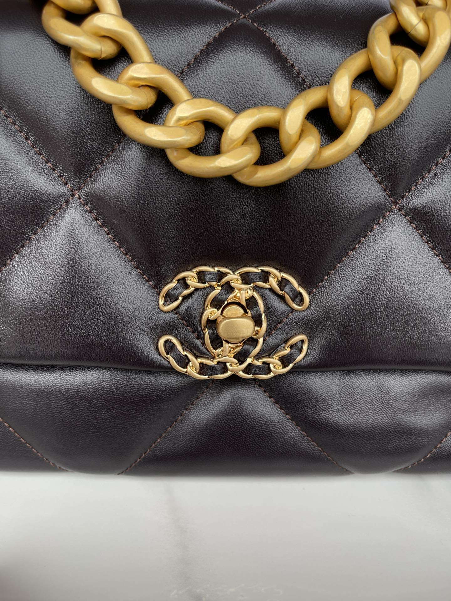 Ch**el 19 LARGE HANDBAG Shiny Leather, Gold-Tone, Silver-Tone & Ruthenium-Finish Metal Black 7.8 × 11.7 × 3.9 in