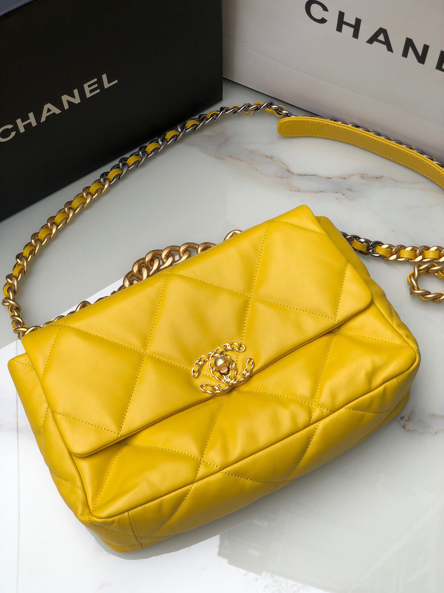 Ch**el 19 LARGE HANDBAG Shiny Leather, Gold-Tone, Silver-Tone & Ruthenium-Finish Metal Yellow 7.8 × 11.7 × 3.9 in